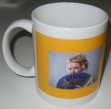 Choice of a Susana Ellis mug or a Susana Ellis portfolio (notepad)