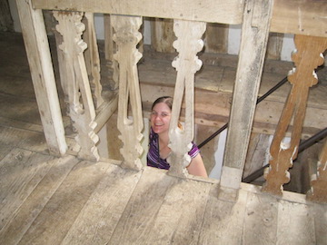 Author Cora Lee coming up the stairs of the gatehouse